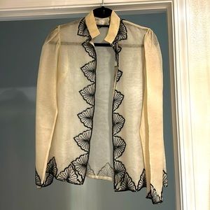 Festive beautifully beaded outer layer.